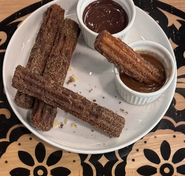 Churros with Mexican chocolate dipping sauce at MEXIKAN in Heritage Valley, Edmonton