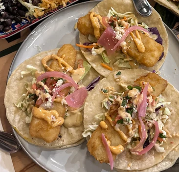 Baja fish tacos with cabbage, pickled onion and chipotle mayo at MEXIKAN in Heritage Valley, Edmonton